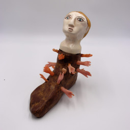 <em>THERE WAS AN OLD WOMAN WHO LIVED IN A SHOE</em>, Ceramic and plastic